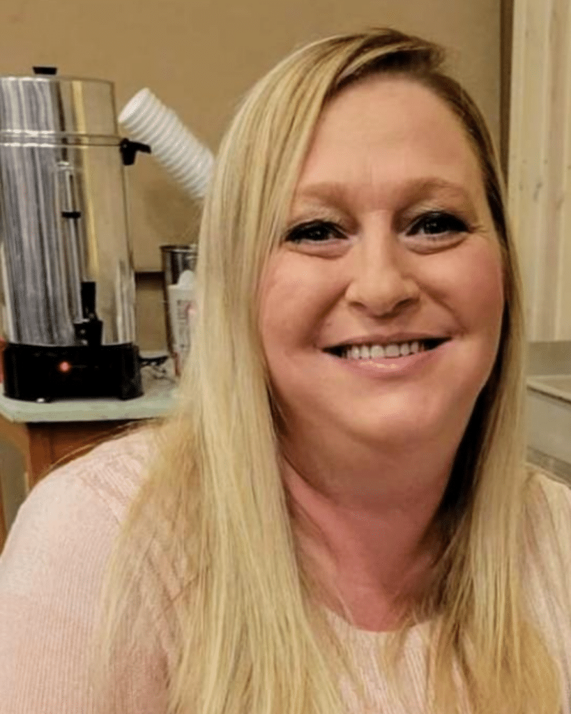 Debra, Treatment Center Director at AppleGate Recovery in Crestview Hills, KY smiling brightly as she celebrates recovery and hopes that her addiction recovery story motivates others.