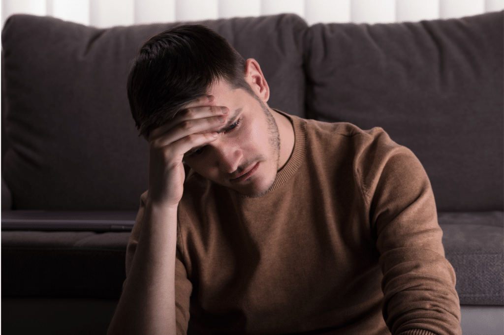 man thinking about how he is going to manage addiction relapse triggers