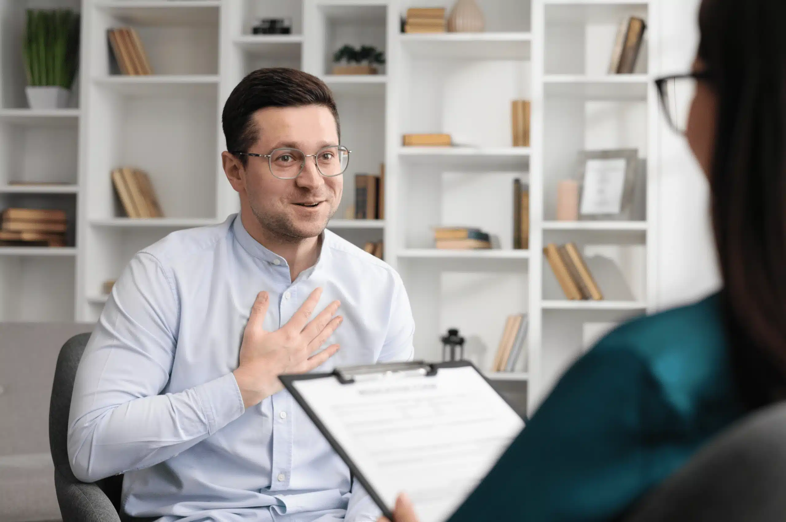 Man talking to female counselor